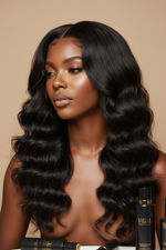 Black woman wearing water wave human hair wig